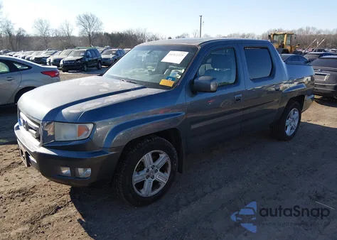 2011 Honda Ridgeline Rtl z USA, uszkodzony, nr VIN 5FPYK1F55BB004059